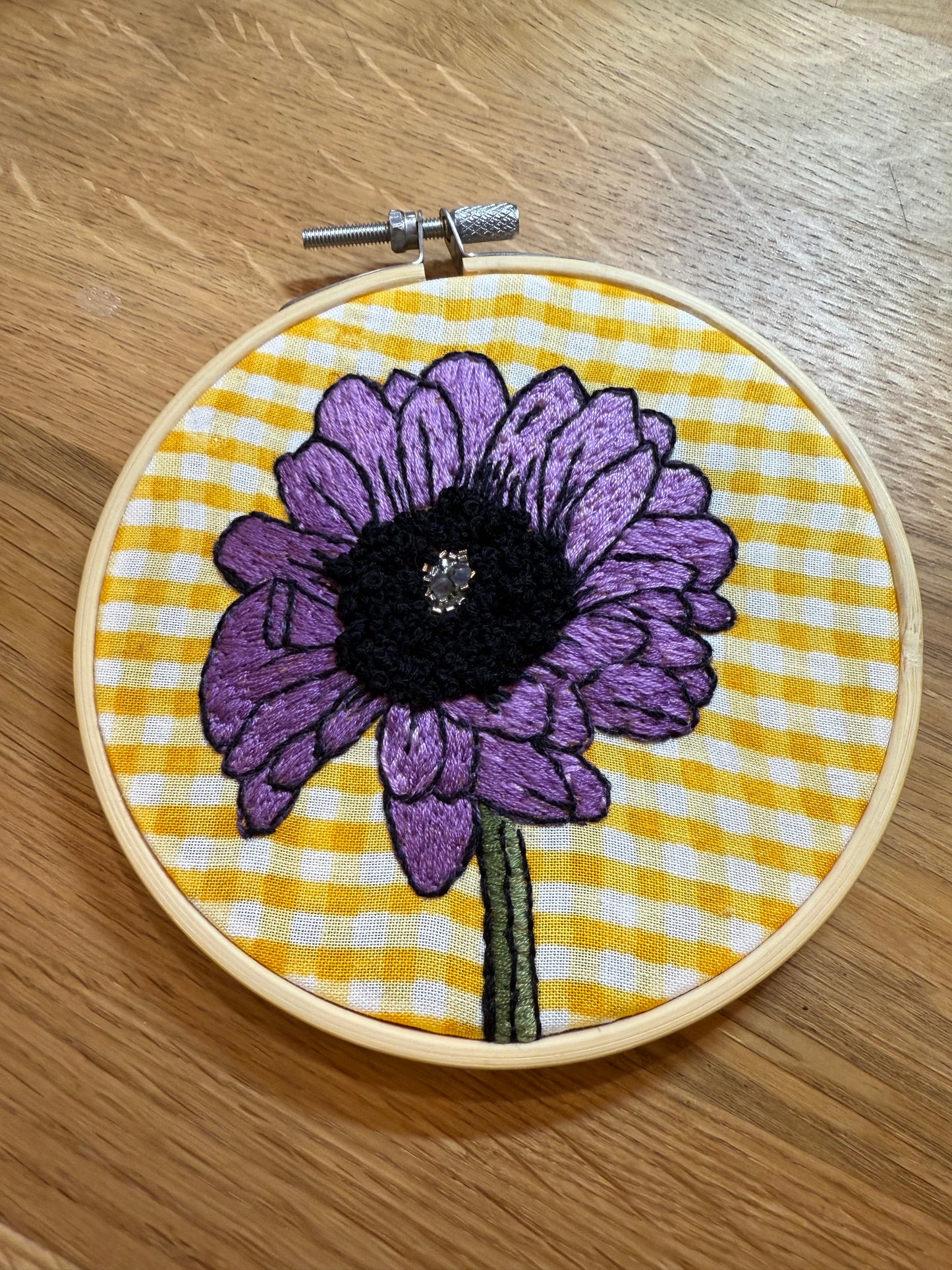 Purple Flower on Gingham Background